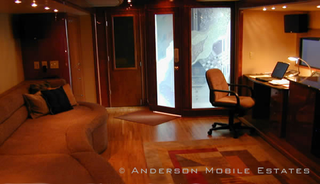 Illustration for article titled Inside Ashton Kutcher's $9,000-a-week "Two and a Half Men" mega-trailer